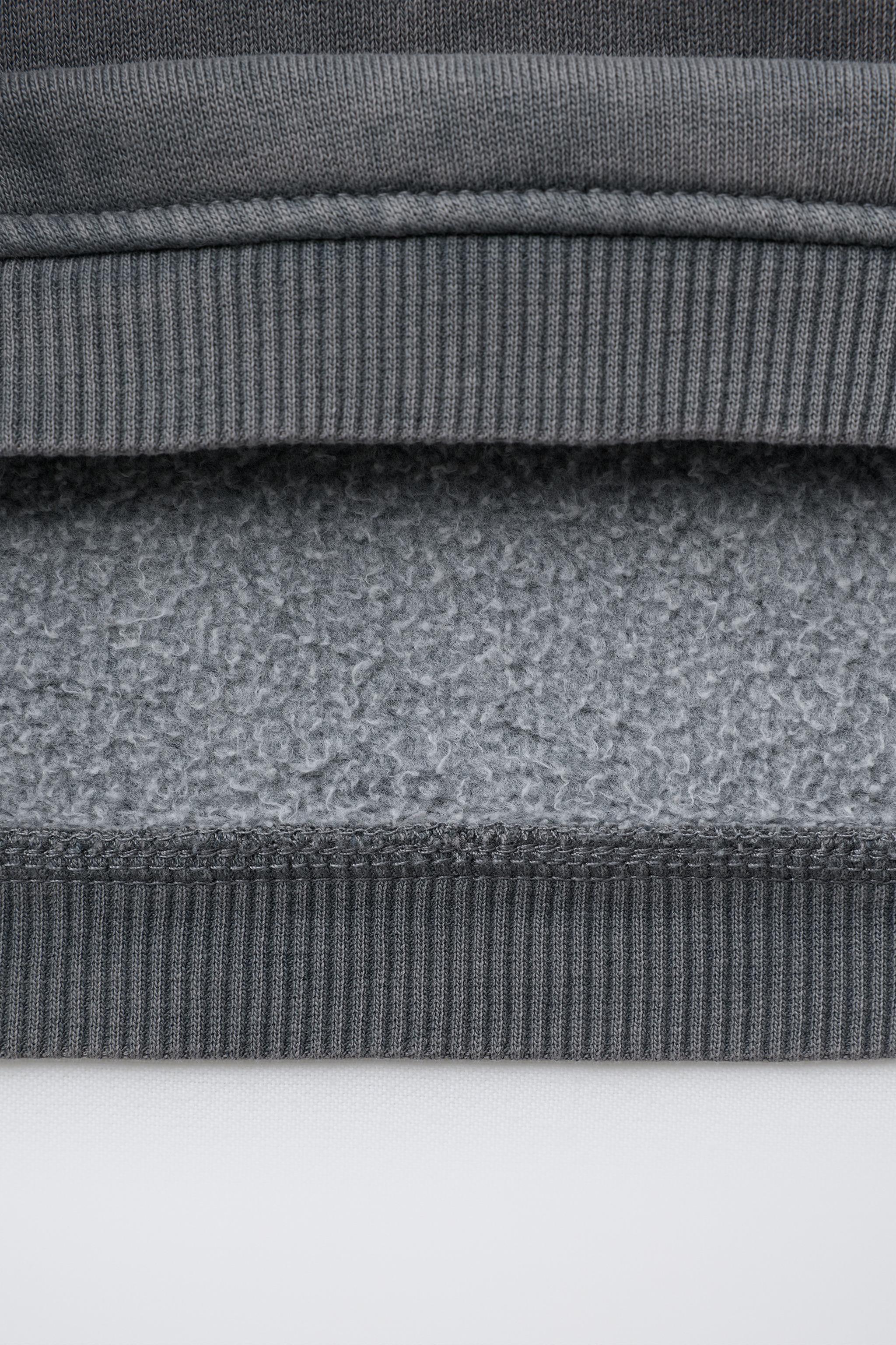 EMBROIDERED WASHED EFFECT SWEATSHIRT